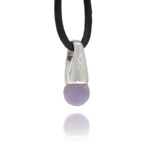 Necklace with a silver pendant and purple agate crystal on a white background