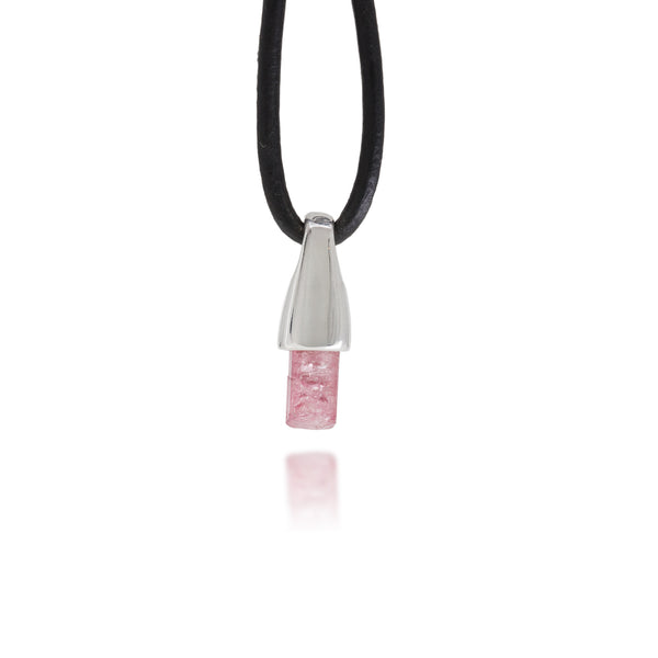 Necklace with a sterling silver and pink tourmaline crystal pendant on a white background