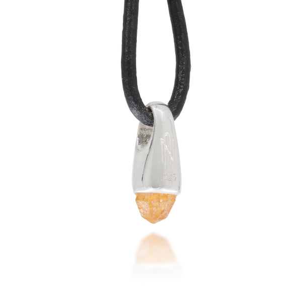 Necklace with a silver and orange crystal pendant on a black cord against a white background, with Astronumen logo and .925 etched into the pendant