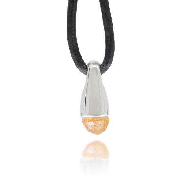 Necklace with a silver and orange pendant on a white background